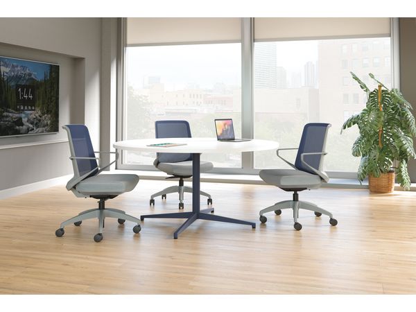 Cliq chairs with Preside round conference table.