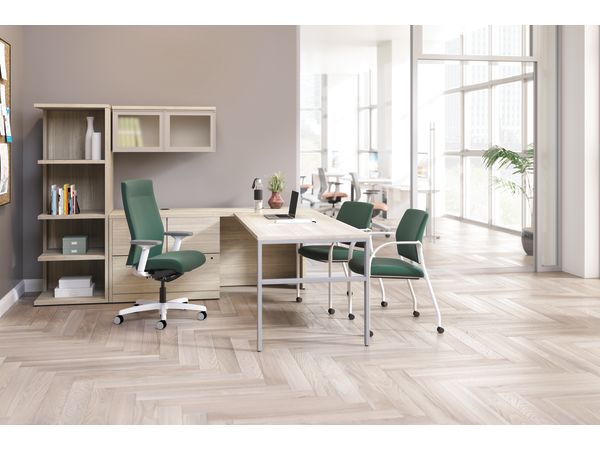 Ignition upholstered chair at 10500 Series L-shaped desk with 2 guest chairs.