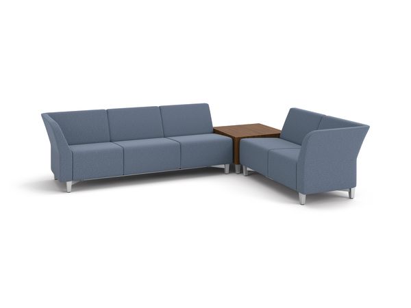 Flock 3-seat and 2-seat sofas in L-shape layout with cube table in between.