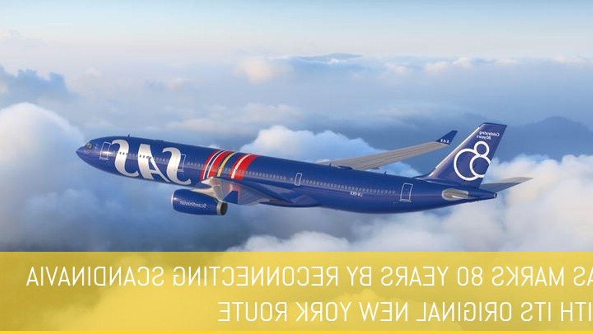 SAS Airbus A330-300 in blue 80th-anniversary livery flying above clouds.