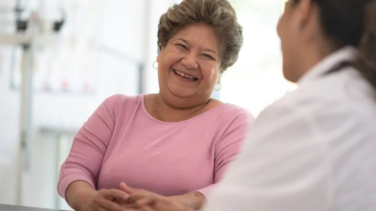 A patient and a doctor in a consultation.