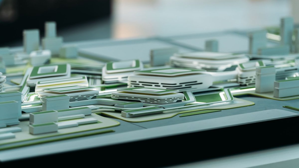 Close-up view of a futuristic architectural model showcasing urban design elements.