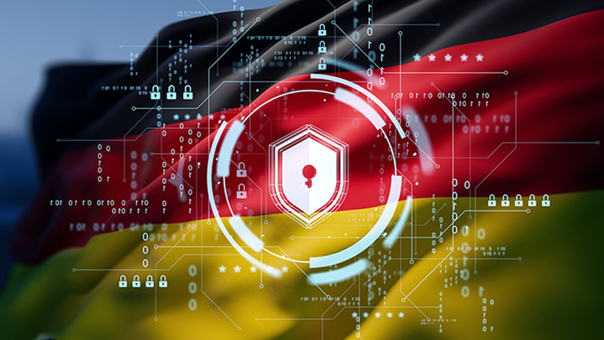 Digital shield and lock hologram over waving Germany flag, futuristic HUD style on dark background, concept of cybersecurity 