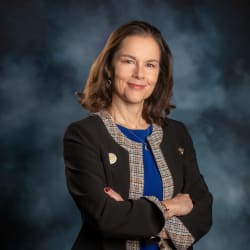 Claudia Swanik - Sales Director with Mary Kay Logo