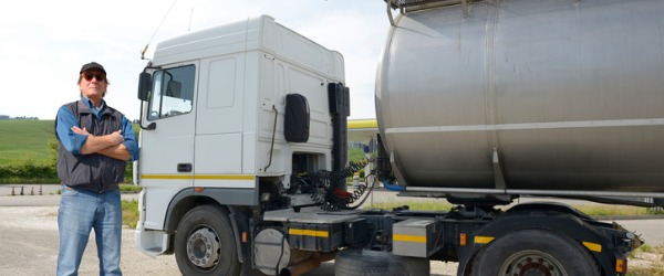A Truck Driver earns a living by driving a truck and transporting goods and materials over land.