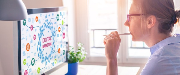 A search marketing strategist working at her computer.