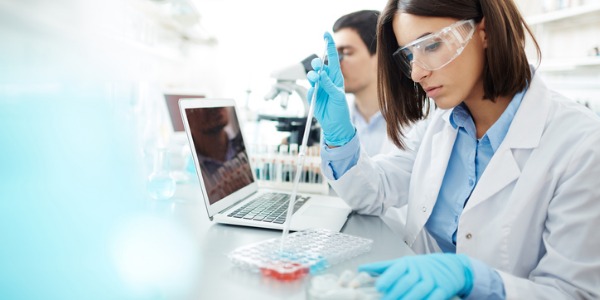 A medical laboratory technologist analyzing samples.