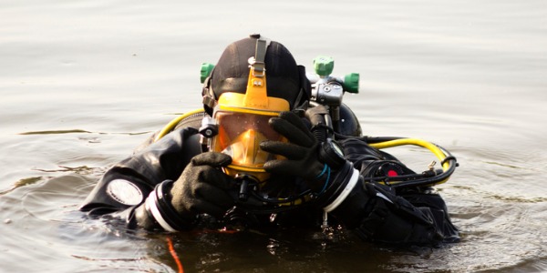 A commercial diver is a professional who is paid to go underwater to do specific tasks, such as construction, retrieval, maintenance, inspection, welding, repairs, deep sea exploration, and photography.