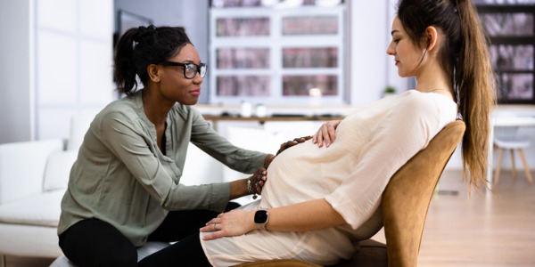 A doula with an expecting mother.