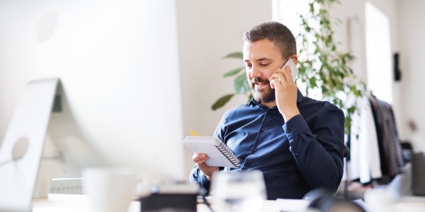 An entrepreneur working at his desk.