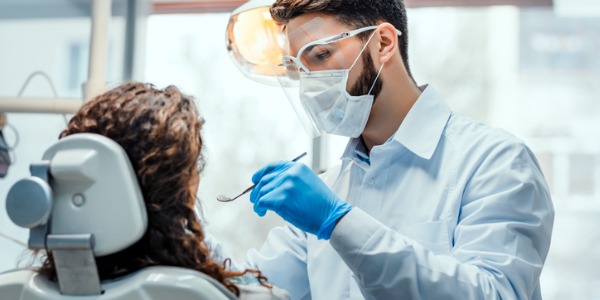 A periodontist with a patient.