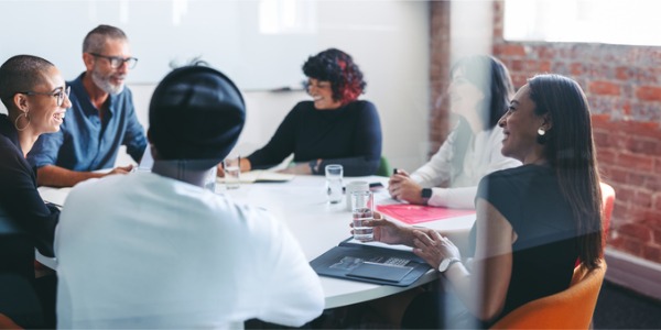 An executive film producer collaborating with the production team.