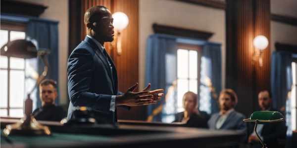 A lawyer presenting to a jury.