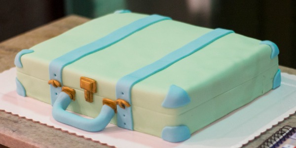 A sculpted cake made to look like a suitcase.