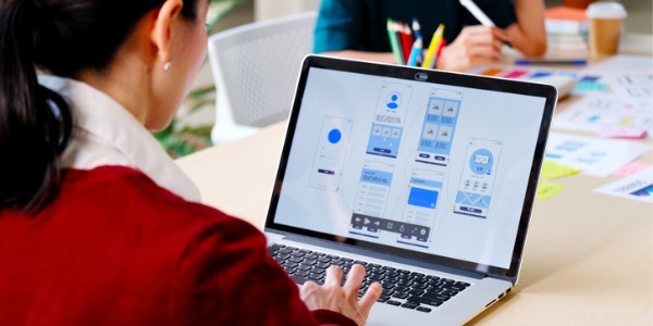 An information architect creating a wireframe.