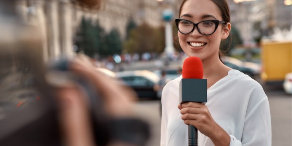 A news reporter covering an event.