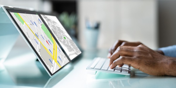 A cartographer revising an existing map.