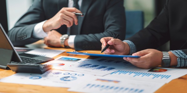 A CEO discussing company financials with his COO.