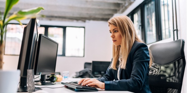 A CIO working on her computer.
