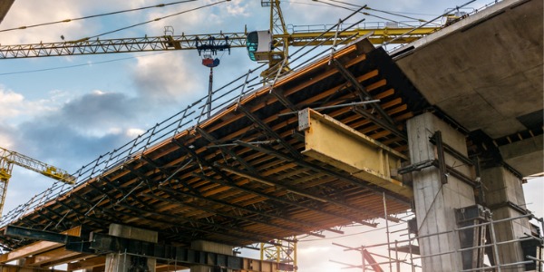 A new bridge project being constructed under the supervision of a civil engineer.