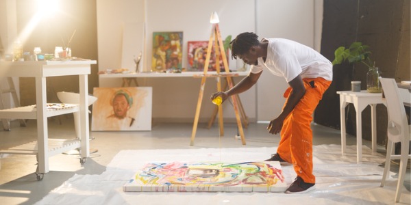 An artist creating a painting.