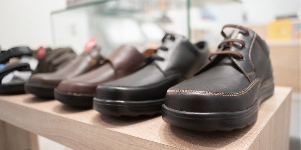 A row of orthopedic shoes.
