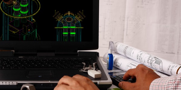 A drafter using computer aided design.