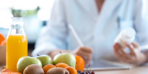 A nutritionist working at her desk.