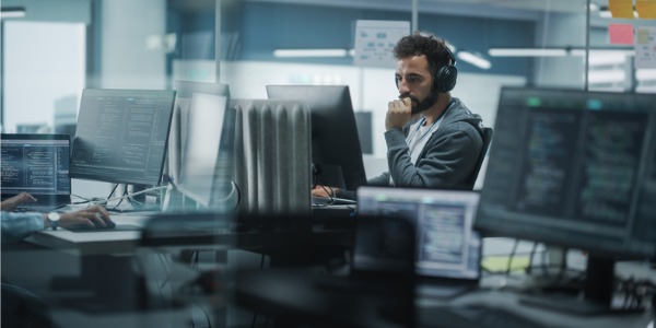 A blue teamer monitoring for potential security breaches.