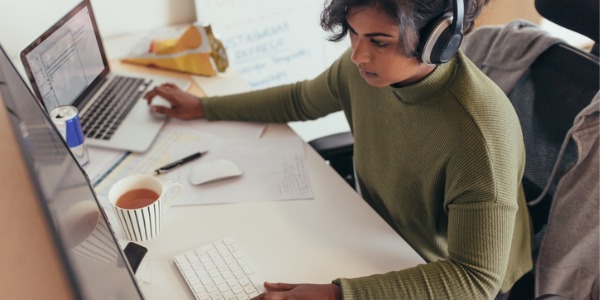 A medical transcriptionist working on her computer.