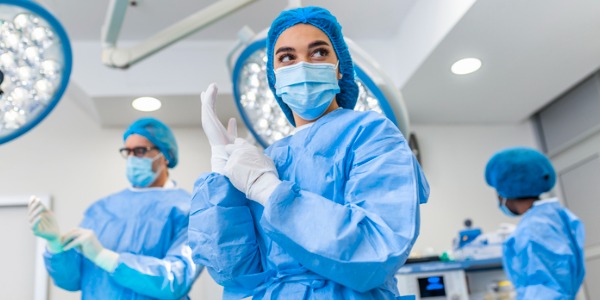 A surgical assistant in the operating room.