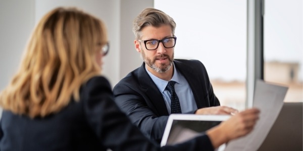 An environmental consultant working with a client.