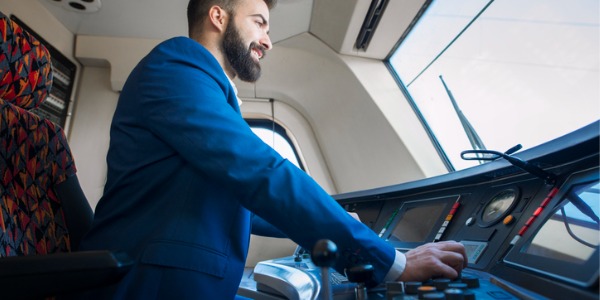 A locomotive engineer driving a train.