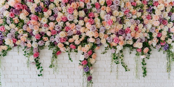 A floral wall created by an event florist.