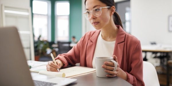A buyer working on her computer.