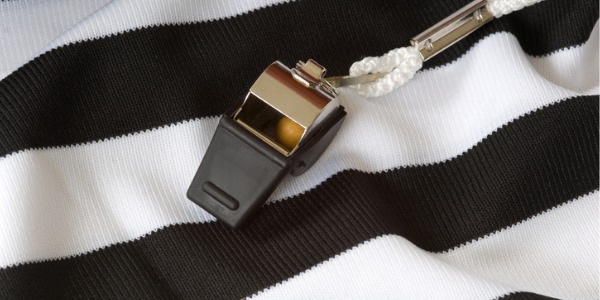 A referee shirt and whistle.