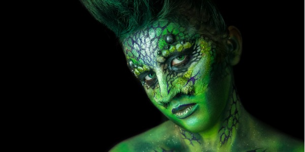 A reptilian alien female done by a special effects makeup artist.