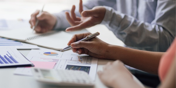 An energy broker having a meeting with a client.