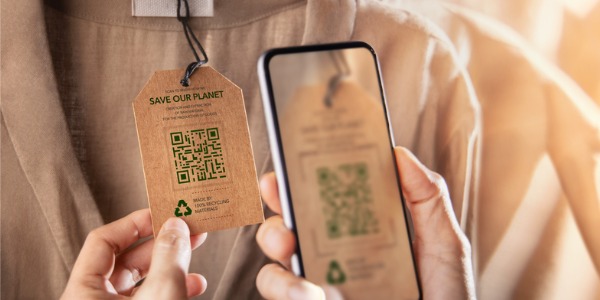 A garment on a hanger that is made of recycled products.