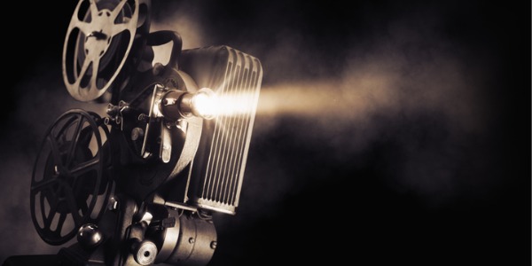 An image of a movie projector, used by a projectionist.