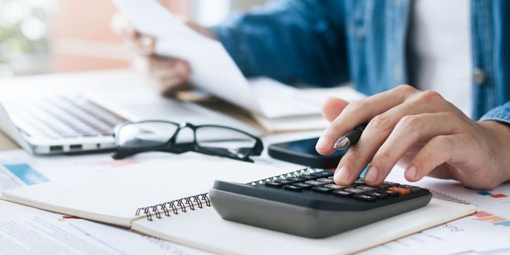 A cost estimator using a calculator.