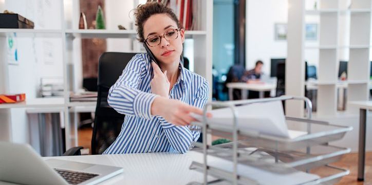 An office clerk working at her desk.