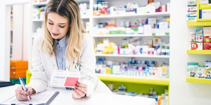 A pharmacy technician dispensing medication.