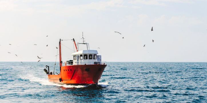 A fishing boat on the open water.