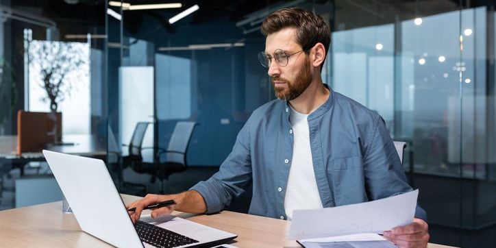 A subject matter expert working at his desk.