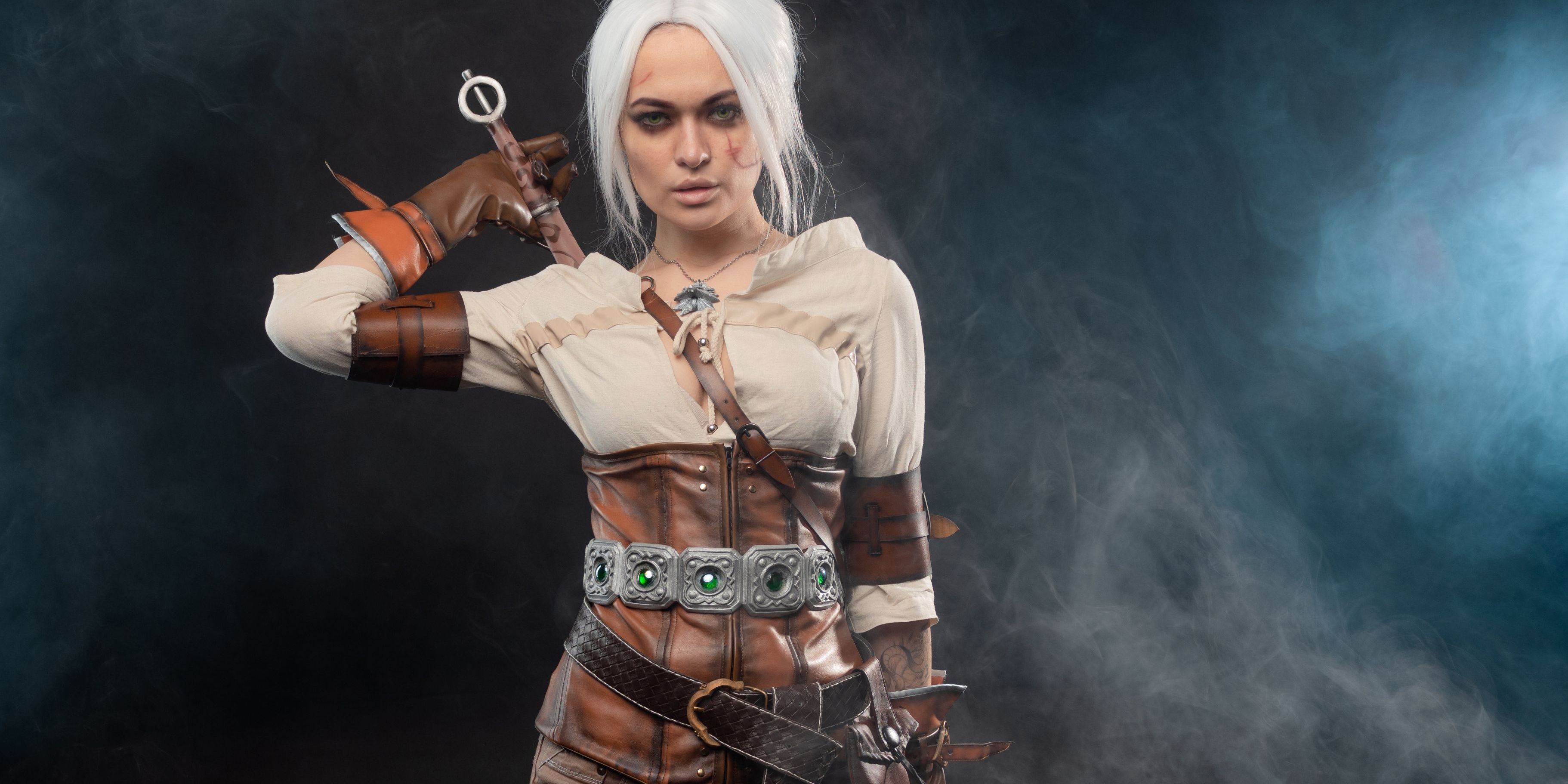 A fantasy heroine warrior with a sword on her back.