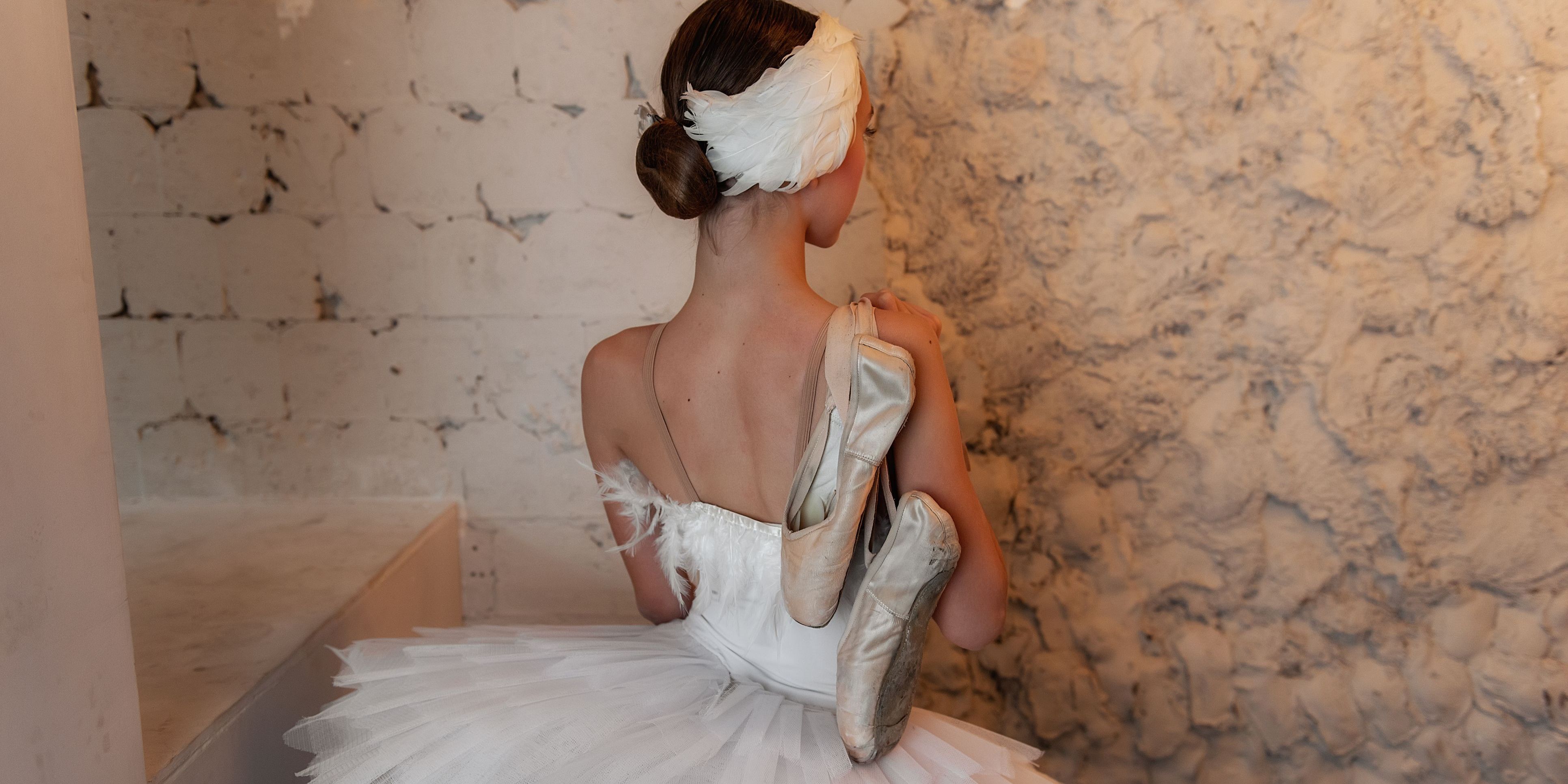 A ballerina wearing a swan lake dance costume.