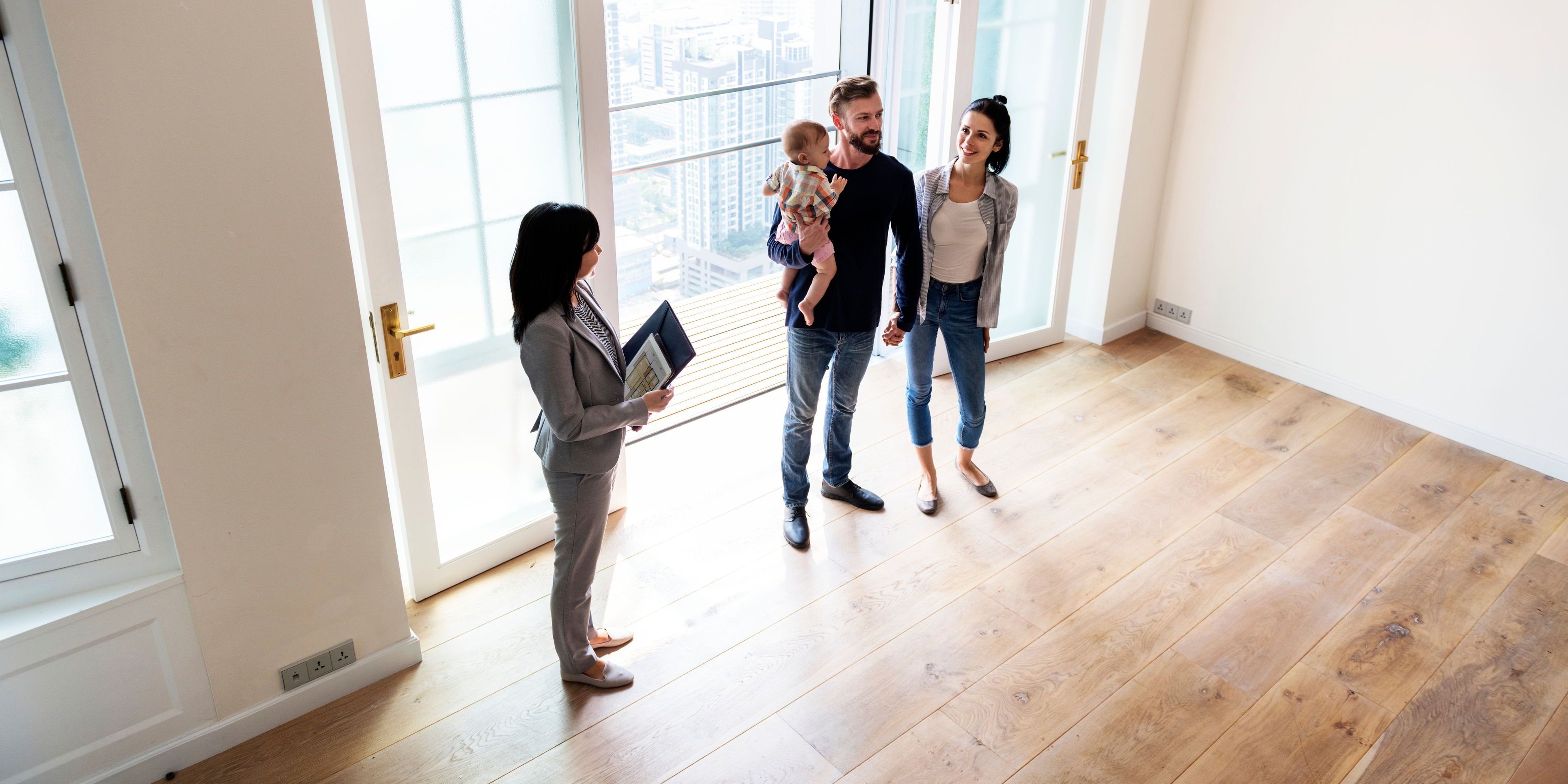 A buyer's agent going through a house with their clients.