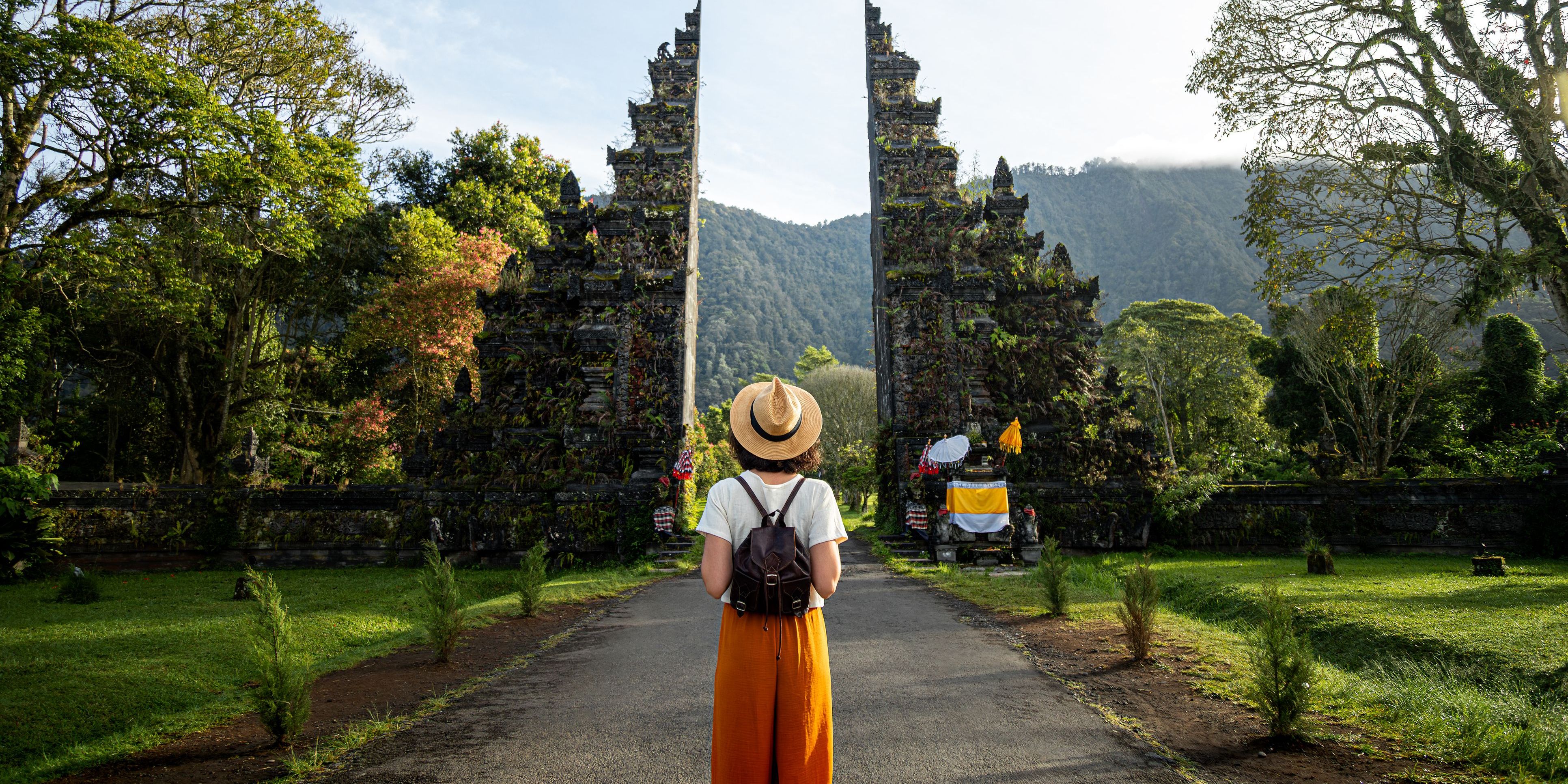 A cultural resource manager at the Balinese Hindu temple entrance.