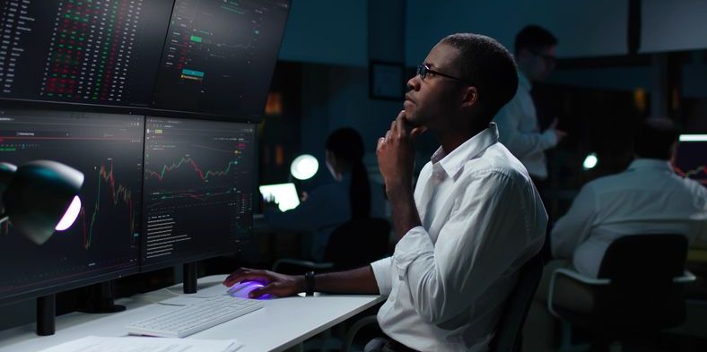 A high-frequency trader monitoring real-time market data.